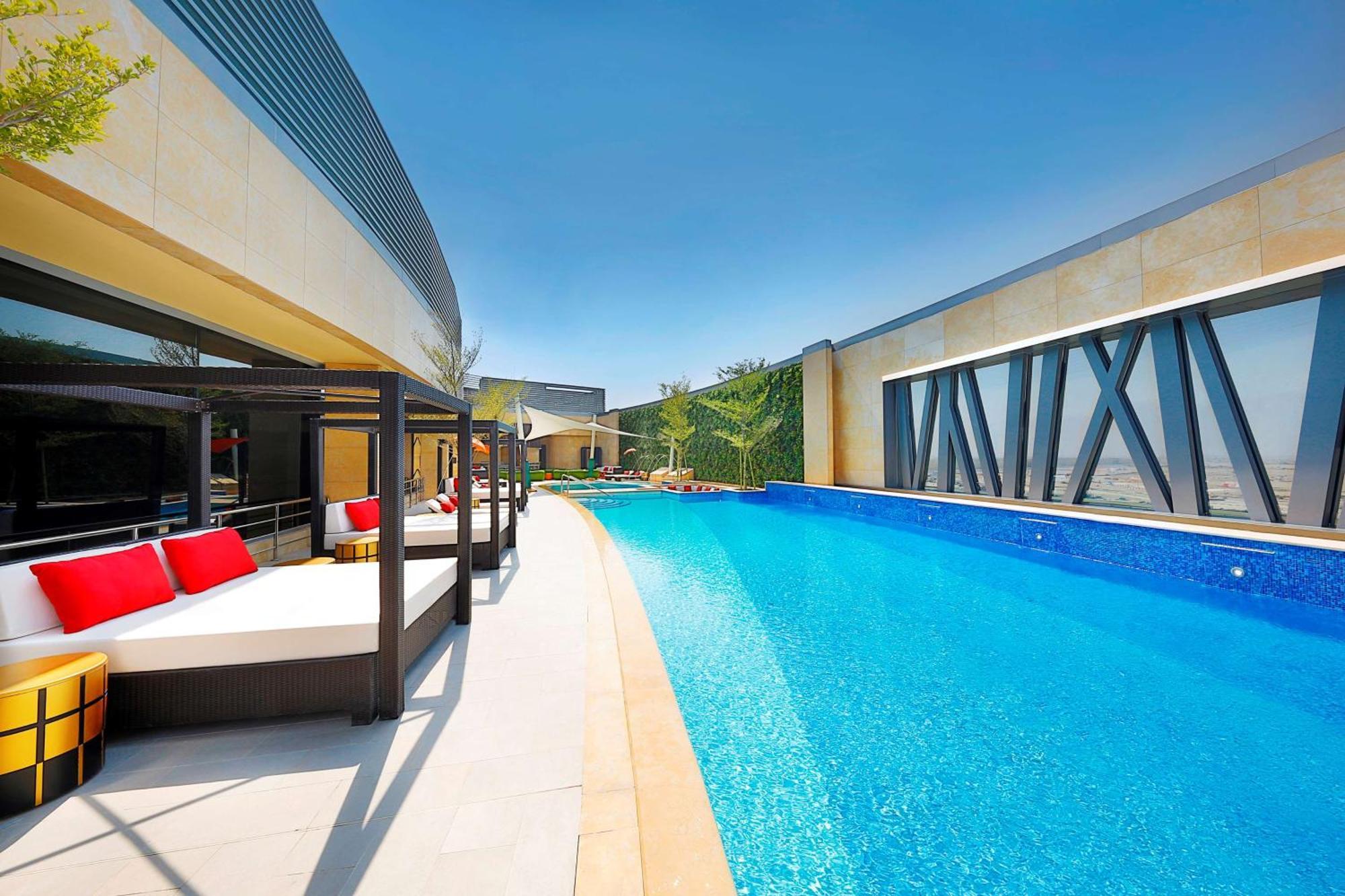 Alrayyan Hotel Doha, Curio Collection By Hilton Al Rayyan Exterior photo The swimming pool at the 101 Sky Lounge